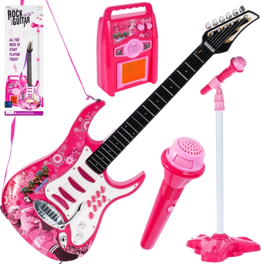 Roze gitaar met versterker en microfoon