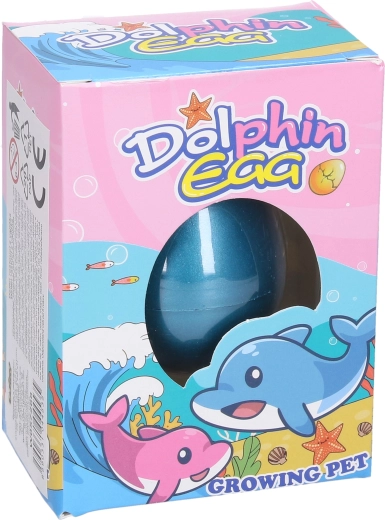 Groeiende dolfijn in ei 6,5 cm