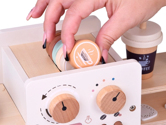 Realistische koffiemachine met capsules en draaiknoppen
