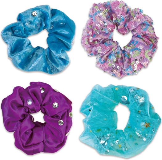 Glitterversiering: pailletten, pompons en lijm