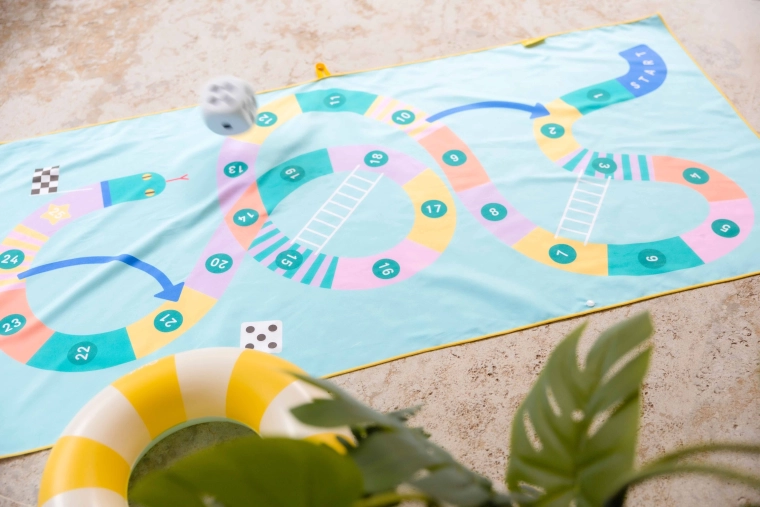 Spel Slangen en Ladders direct op de handdoek