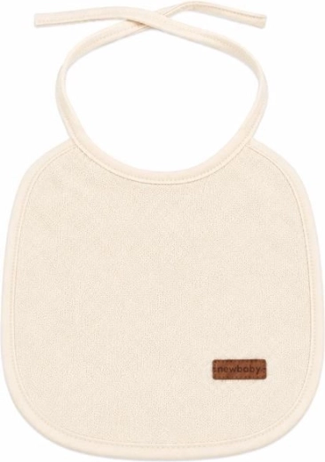 Kinder badstof slabbetje New Baby met PVC-onderlaag beige - 1 stuk