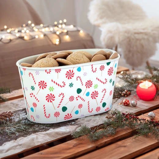 Kerstmetalen mandje met zuurstokmotief