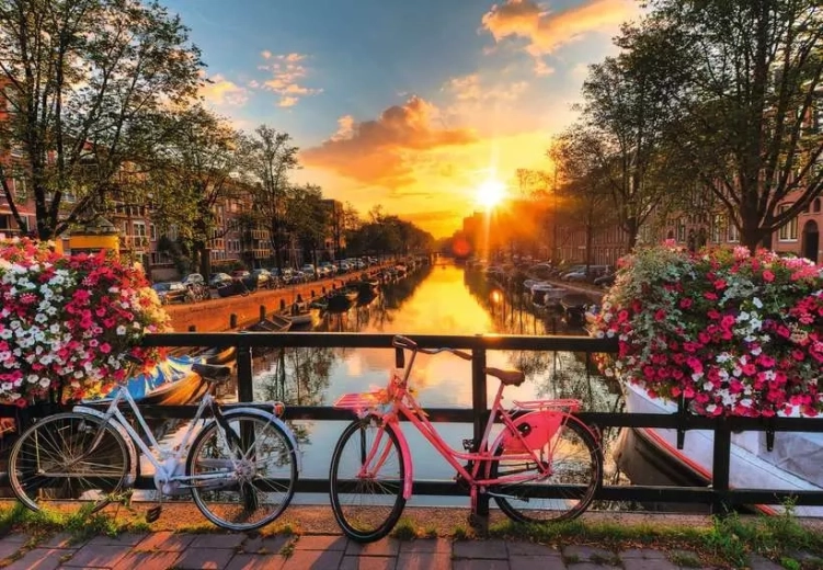 Ravensburger puzzel Zonsondergang in Amsterdam XL 200 stukjes
