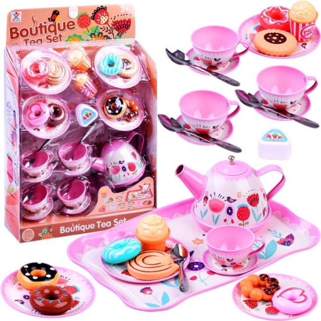 Metalen theeset voor kinderen met desserts