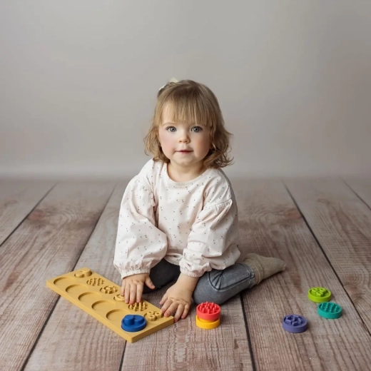 Eenvoudig vast te pakken en ontwikkeling van de fijne motoriek