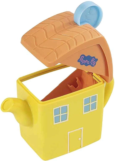 Muzikaal theepotje in de vorm van een huisje