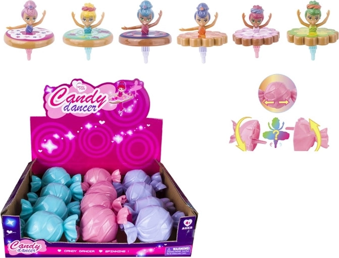Ballerinapop die als tol draait in cadeauverpakking in de vorm van een snoepje