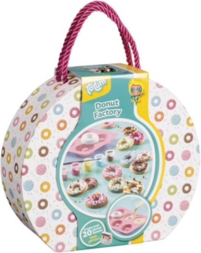 Creatieve set donutjesfabriek in een kartonnen koffertje