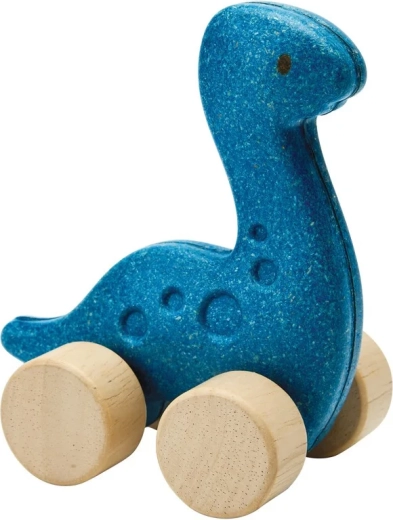 Een dinosaurus op wieltjes die plezier geeft