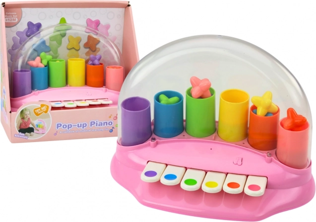 Interactieve roze piano met schietende sterretjes