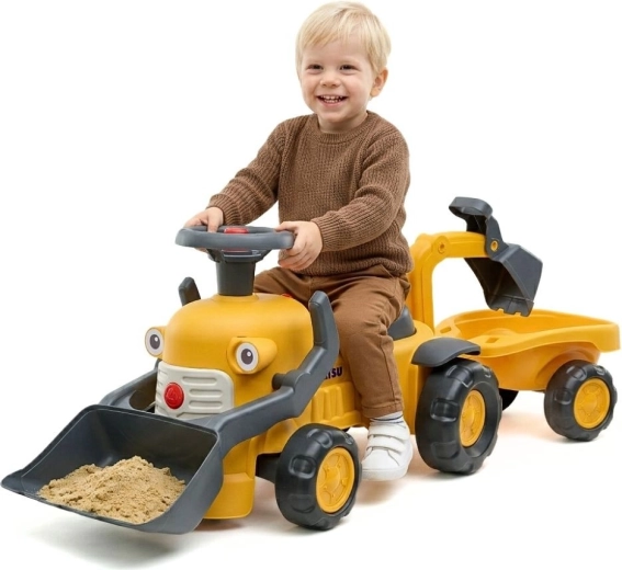 Loopauto Komatsu met laadschop, graafarm en aanhanger