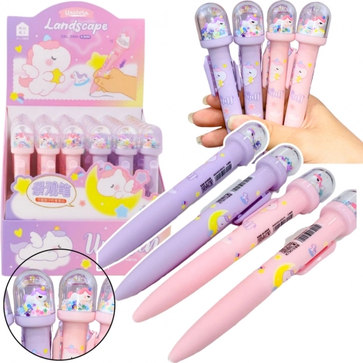 Balpen met glinsterende koepel en eenhoornfiguurtje met blauwe inkt