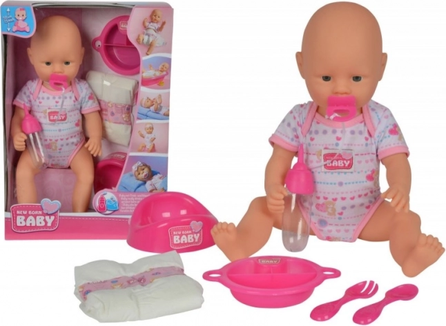 Pasgeboren baby met accessoires