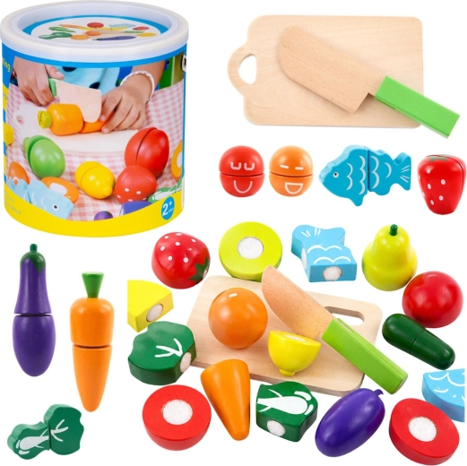 Houten set met snijbaar fruit en groenten in een emmer met snijplank en mes