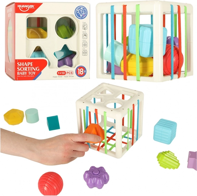 Elastische sensorische kubus met vormindoener