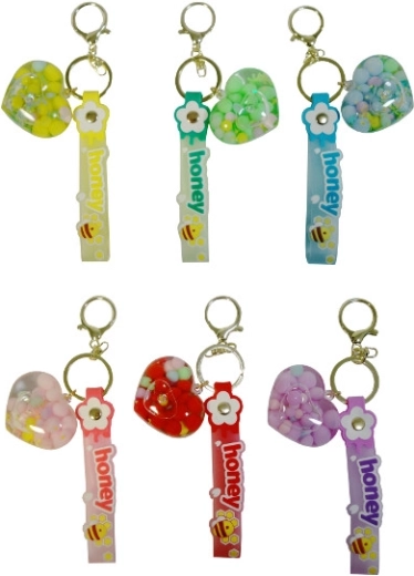 Sleutelhanger met kralenhart en opschrift Honey