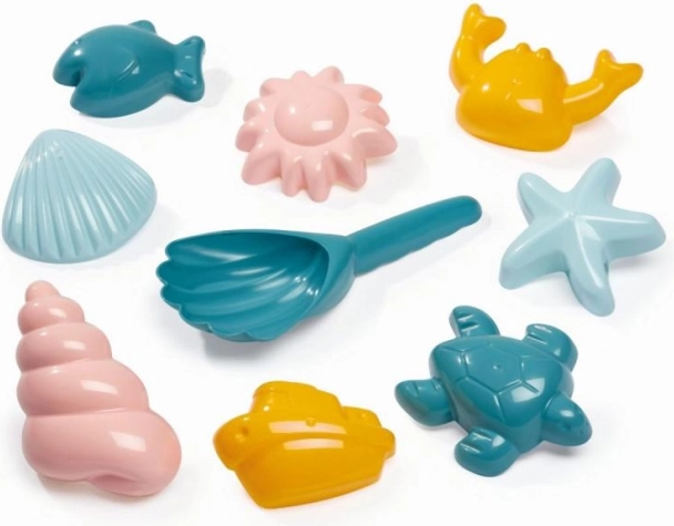 Set zandvormpjes met zeethema en schepvormige schep