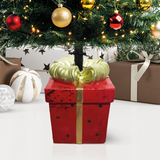 Kerstboomstandaard in de vorm van een geschenkdoos