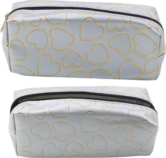 Zilveren etui met gouden hartjes