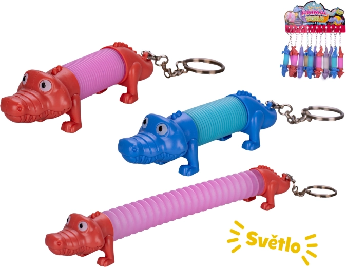 Opwindbare krokodil-sleutelhanger met licht