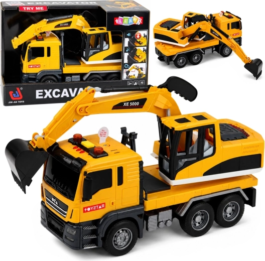 Vrachtwagen met graafmachine met licht, geluid en aandrijving 1:14 - 1 stuk
