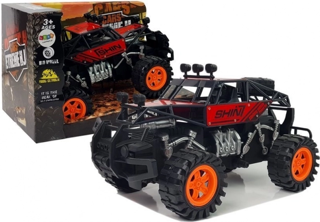 Terrein auto met opwindmechanisme rood
