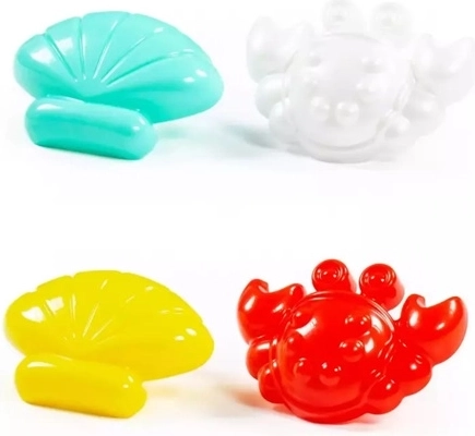 Zandvormpjes krab en schelp