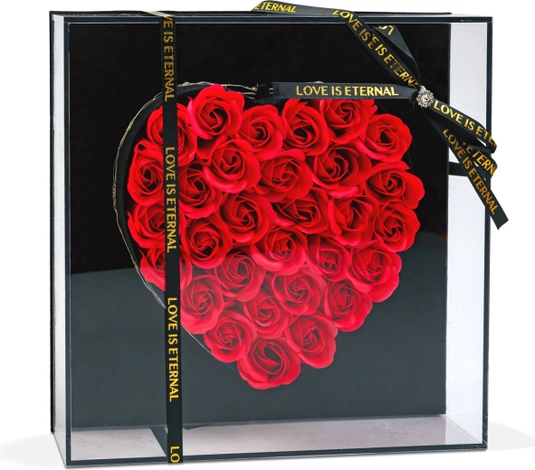 Kunstmatige rode rozen in de vorm van een hart in een geschenkdoos met ledverlichting