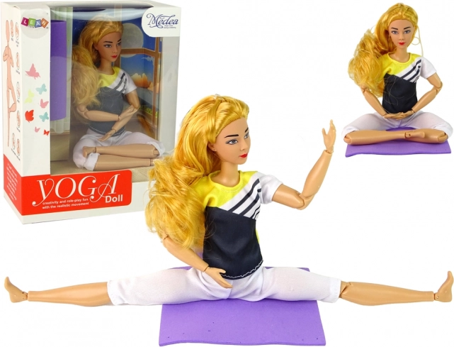 Beweegbare yogapop met lang blond haar en mat