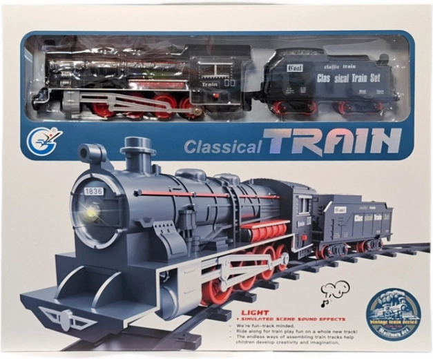 Klassieke batterijtreinbaan met stoomlocomotief en wagon