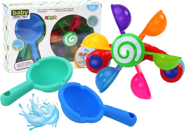 Draaispeeltje voor in bad met kleurrijke kommetjes en twee lepels