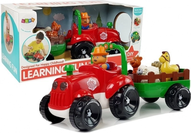 Muzikale tractor met aanhanger en diertjes op batterijen