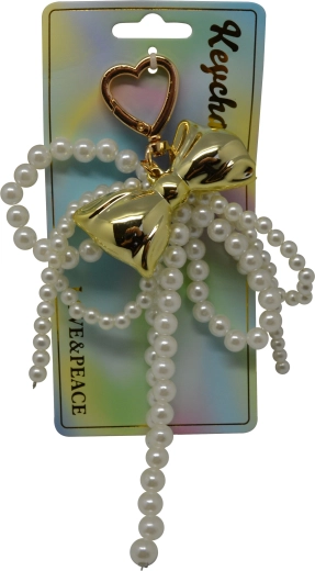 Sleutelhanger met parels, strik en hart