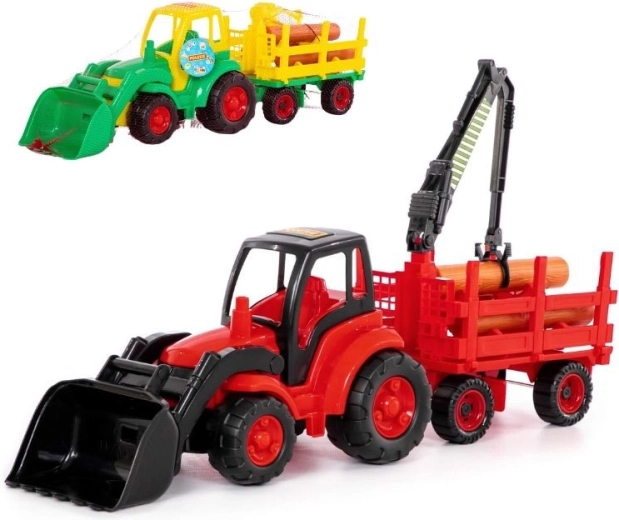 Tractor met voorlader en bosbouwaanhanger