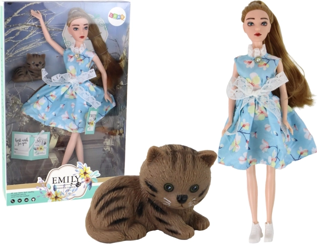 Pop Emily lente met lang haar in een blauwe jurk en met een kitten