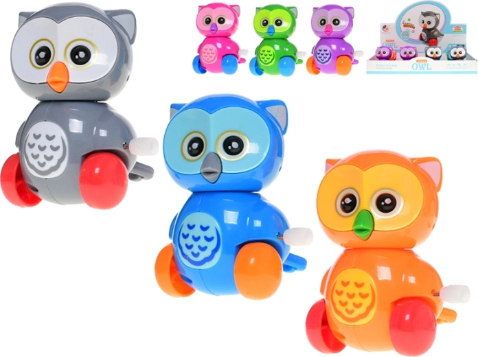 Vrolijke opwindbare plastic uil voor kinderen