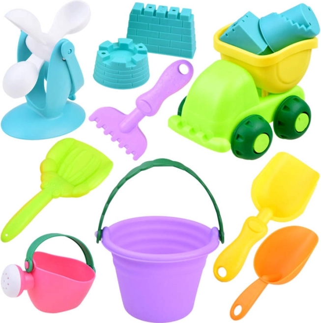 Set zandbak speelgoed met kleurrijke emmer en autootje