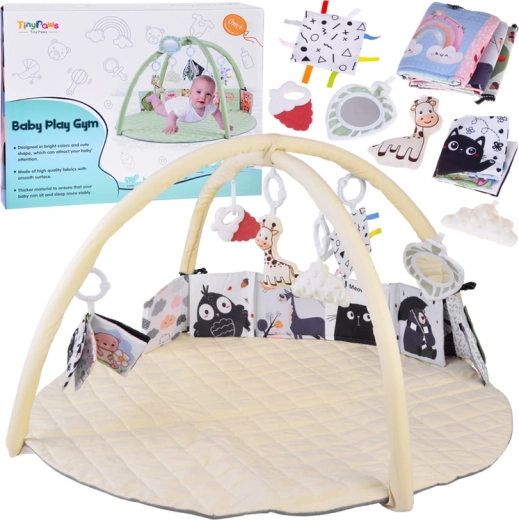 Educatieve speelmat met bogen en hangende speeltjes