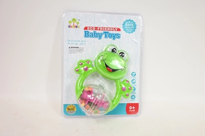 Kinder rammelaar kikker in blisterverpakking