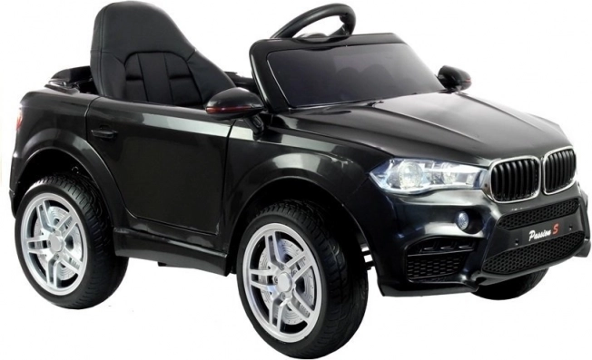 zwart kinderautootje op batterij