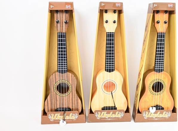 Kinder gitaar in doos