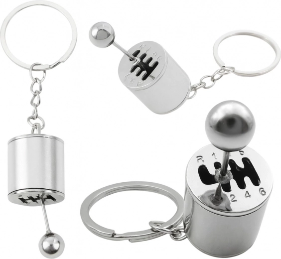 Metalen sleutelhanger in de vorm van een versnellingsbak, zilverkleurig