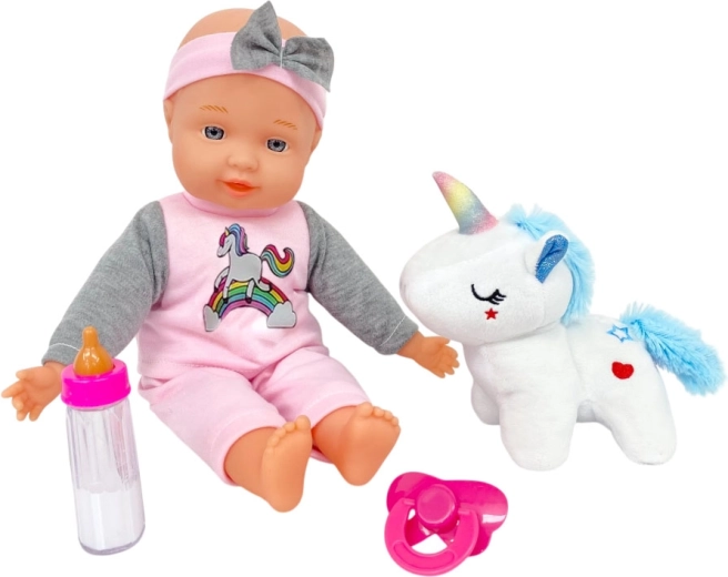 Baby met pluchen eenhoorn 30 cm