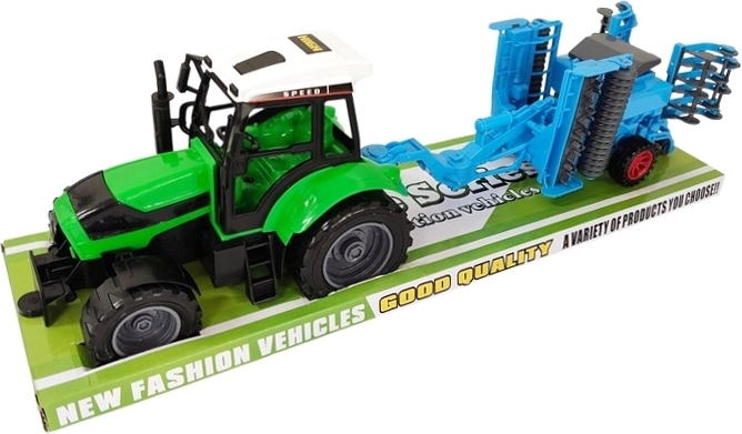 Kindertractor met aanbouwlandbouwmachine