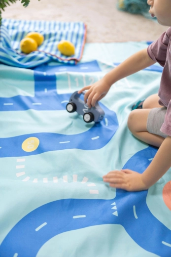 Quut kinderhanddoek en speelmat 2-in-1 weg, L (180 × 100 cm)