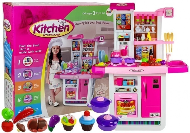 Roze kinderkeuken met water en geluiden
