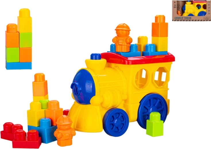 Kleurrijke trein met blokken en figuurtje 28 cm
