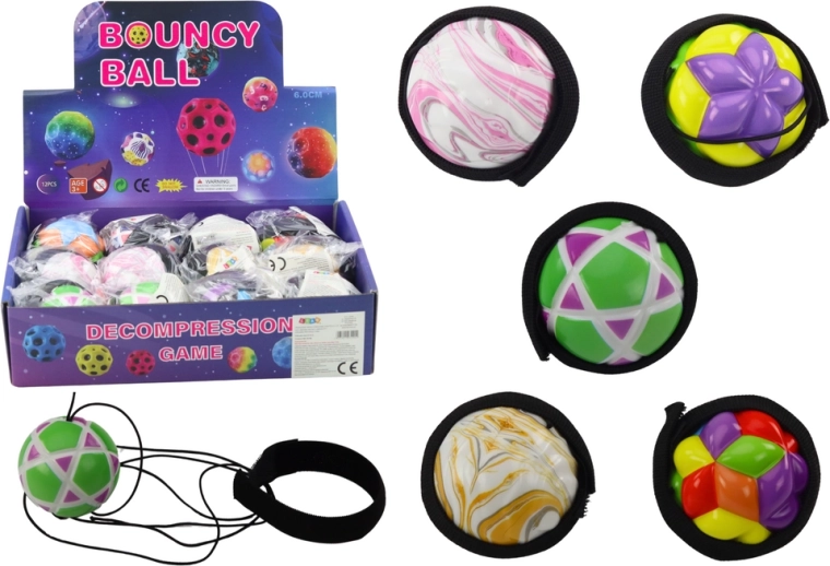 Gekleurde bal aan elastiek met band 6 cm