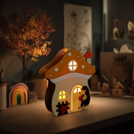 Lichtdecoratie paddenstoelenhuisje met egel van hout
